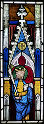 Fragment eines gotischen Glasfensters aus der Pfarrkiche in Winnen: Weibliche Heiligenfigur