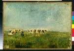 Kühe auf der Weide mit zwei Melkern