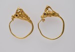 Paar goldene Ohrringe mit Antilopenköpfen