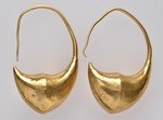 Paar goldene Ohrringe