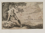 Junge Frau mit Geflügel unter einem Baum