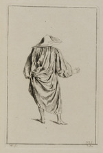 Mann mit großem Hut und weitem Gewand in Rückansicht