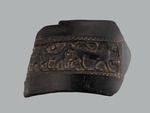 Fragment eines Bandhenkels mit gestempeltem Tierfries einer Bucchero-Amphora Typ Nikosthenes